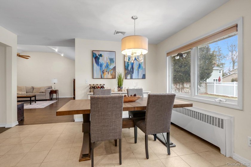Nestled on a quiet, tree-lined street in a highly desirable - photo 5
