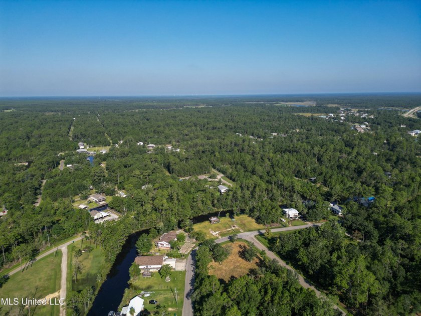 Discover 7.5 Acres in Bay St. Louis! Just 15 minutes from the - photo 8
