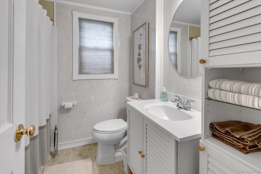 Welcome to this beautifully updated 4-bedroom, 2-bath Cape that - photo 13