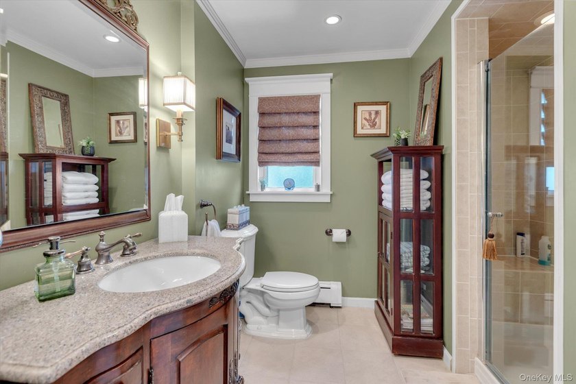 Welcome to this beautifully updated 4-bedroom, 2-bath Cape that - photo 15