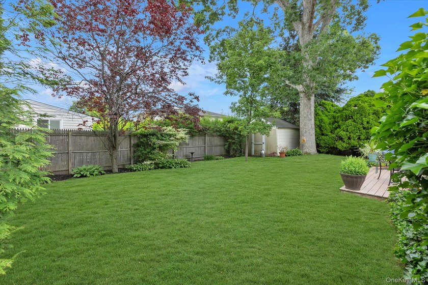 Welcome to this beautifully updated 4-bedroom, 2-bath Cape that - photo 24