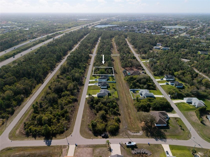 NORTH PORT VACANT LOT! Build your dream home surrounded by - photo 2