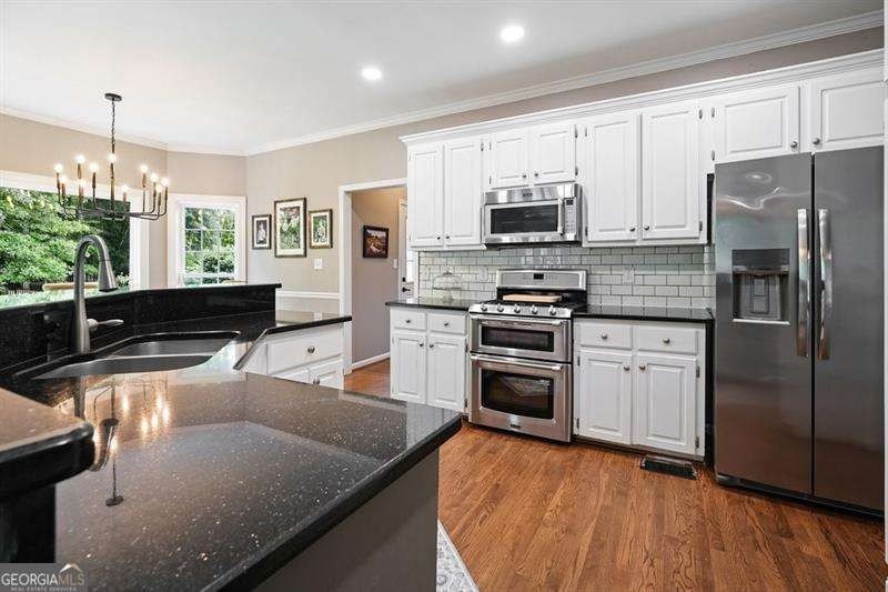 Welcome to 1011 Fairway Valley Drive - a true Southern dream in - photo 17