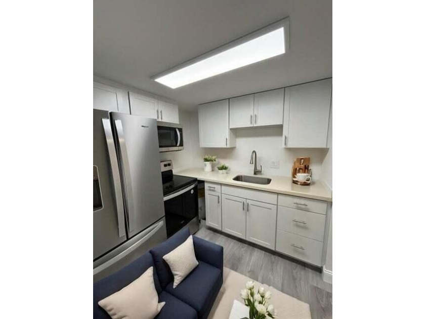 TOTALLY RENOVATED ! !Don't miss seeing this light and bright - photo 6