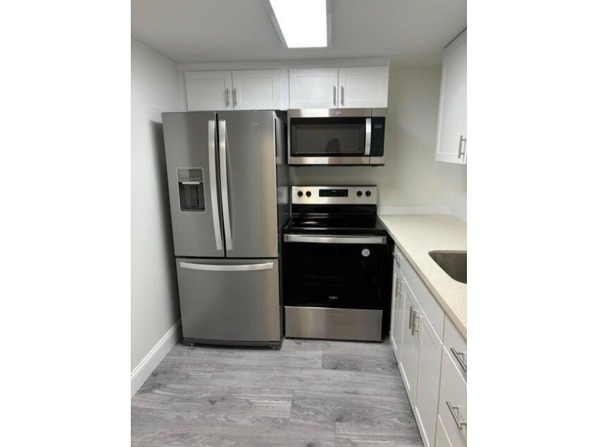 TOTALLY RENOVATED ! !Don't miss seeing this light and bright - photo 7