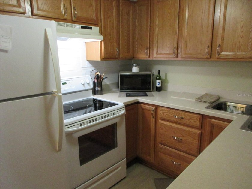 YOU DON'T WANT TO PASS UP THIS BEAUTIFULLY UPDATED, TURNKEY, 1st - photo 7