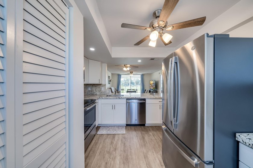 Nestled in a vibrant 55+ community, this completely remodeled in - photo 9