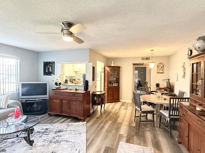 Beautifully updated furnished 1 bedroom, 1.5 bath condo located - photo 3