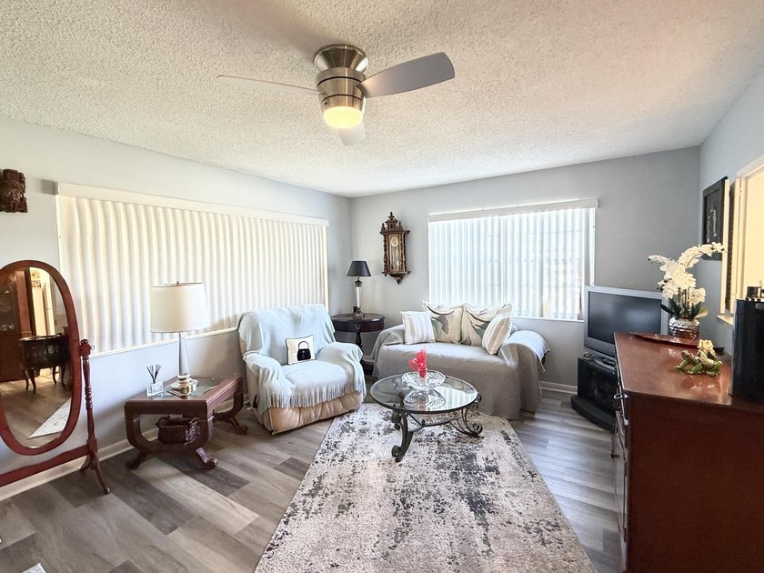 Beautifully updated furnished 1 bedroom, 1.5 bath condo located - photo 4