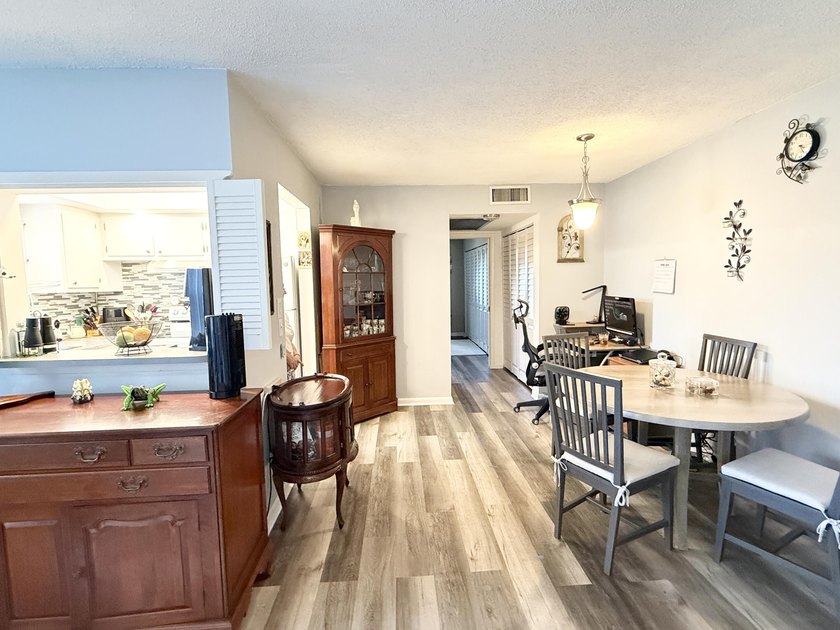 Beautifully updated furnished 1 bedroom, 1.5 bath condo located - photo 6