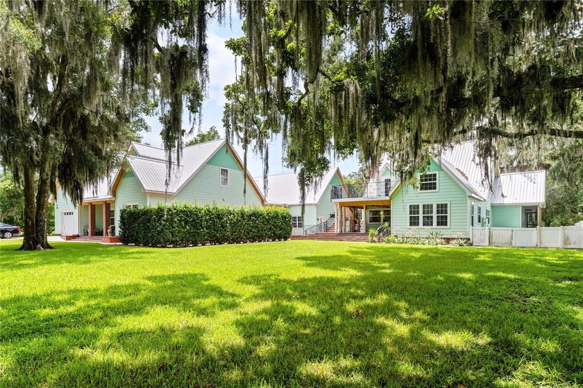 An extraordinary DeLand lakefront estate set on 5+ acres along - photo 3