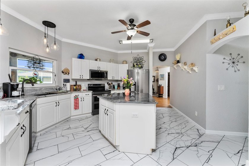 RARE DOUBLE LOT HOME!! This beautifully updated 4-bedroom - photo 10