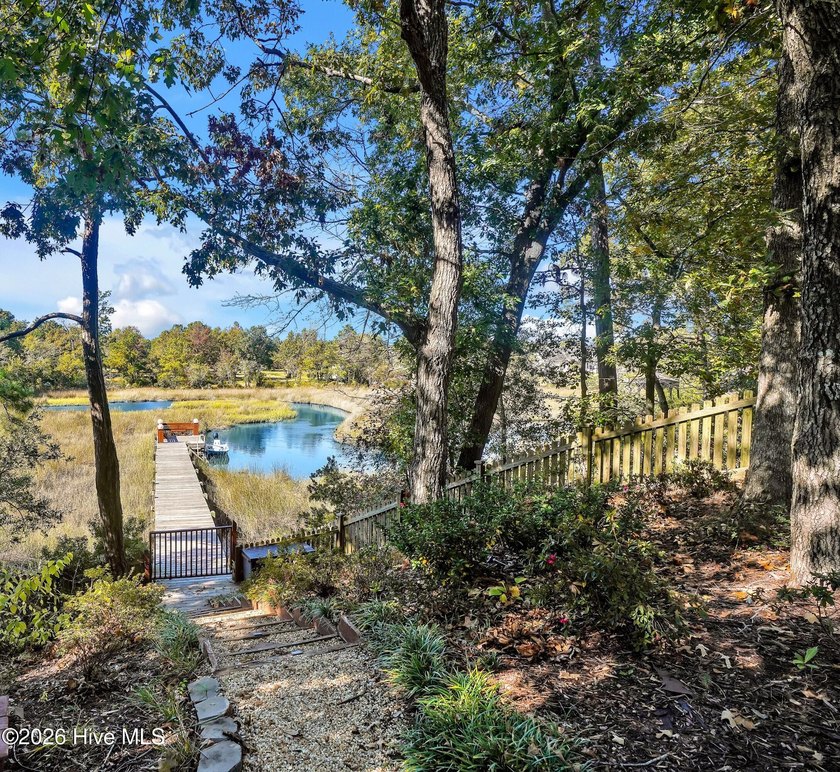 Tucked along a peaceful tidal creek, 101 Teal Circle is the kind - photo 49
