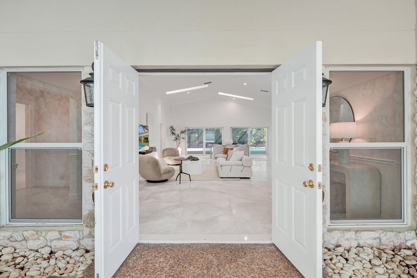 Welcome to 2401 NW 39th St! Situated in the highly sought-after - photo 3