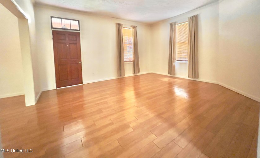 Beautiful 4BR/2BA two-story home offering an ideal blend of - photo 2