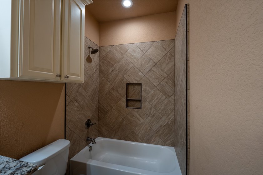 Welcome home to this charming retreat tucked into an established - photo 23