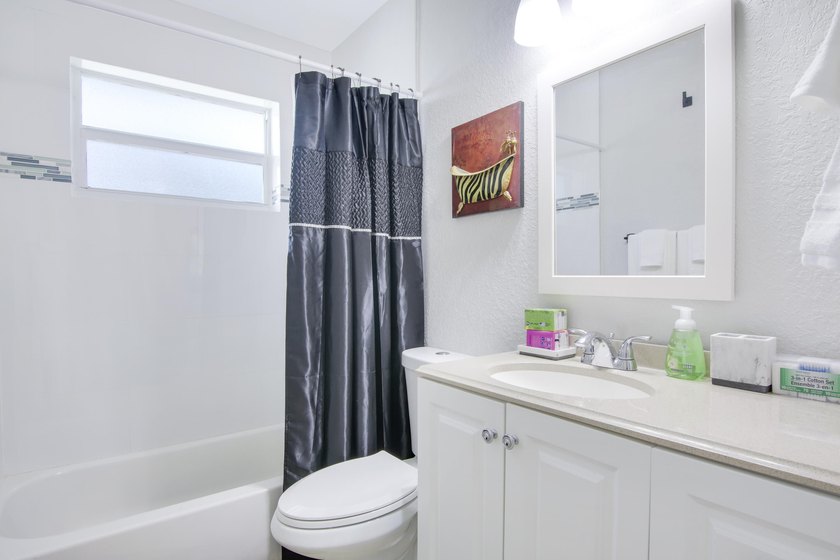 Welcome to this charming 4-bedroom, 2-bathroom home that - photo 11