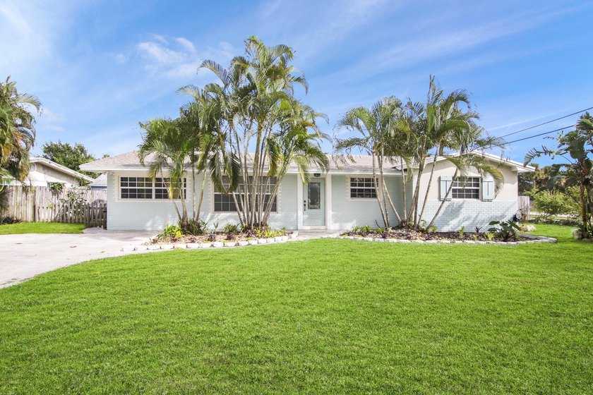 Welcome to this charming 4-bedroom, 2-bathroom home that - photo 17