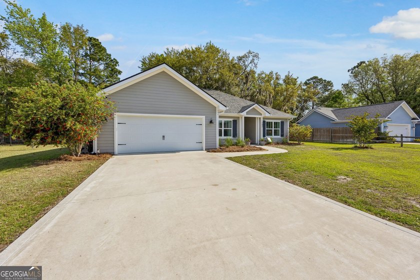 Step into this beautifully designed 4-bedroom, 2-bath home that - photo 2