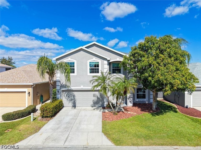 This beautifully maintained pool home in Gladiolus Preserve - photo 2