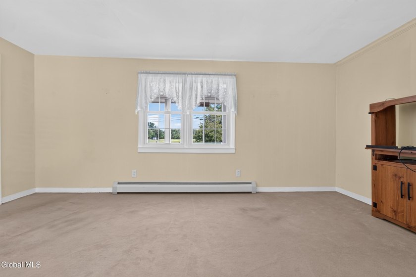 A true little gem, this home offers comfortable living spaces - photo 11