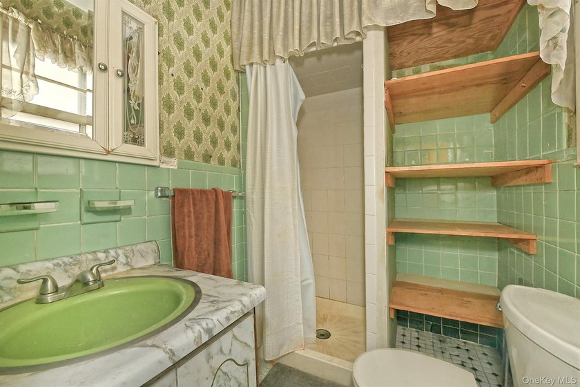 Welcome to 164-16 Goethals Avenue, a 3 bedroom/2 full bath home - photo 9