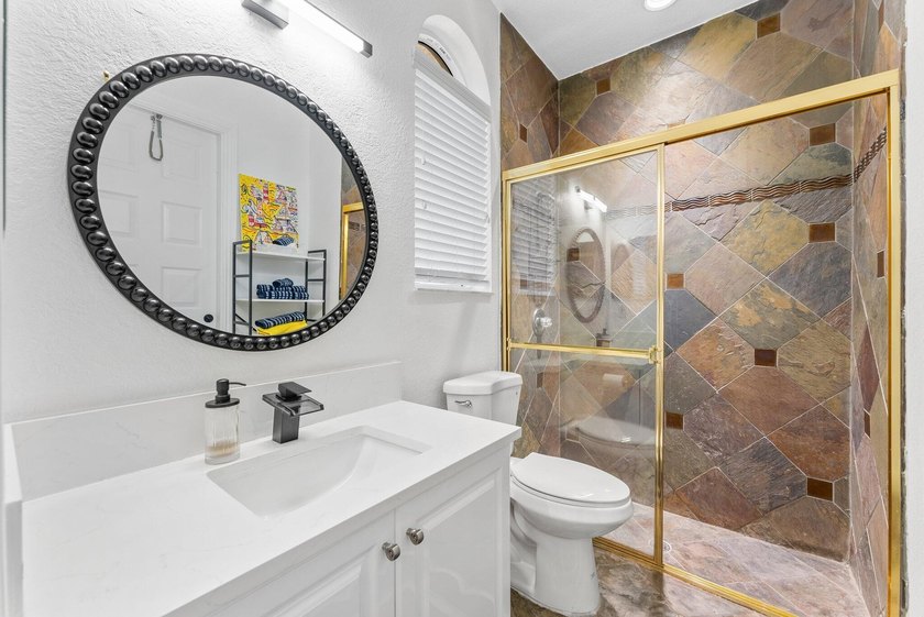 Welcome to this stunning courtyard home with 1/1 separate guest - photo 34