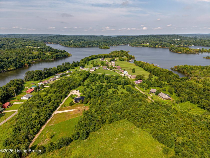 This 1.41-acre wooded lot offers an ideal setting for a - photo 9