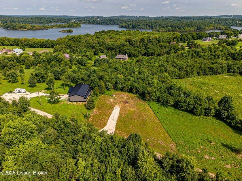 This 1.41-acre wooded lot offers an ideal setting for a - photo 10
