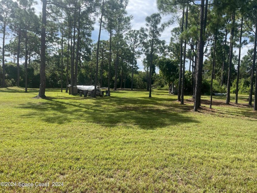 This 2.45 Industrial lot is cleared and has a foundation of - photo 3