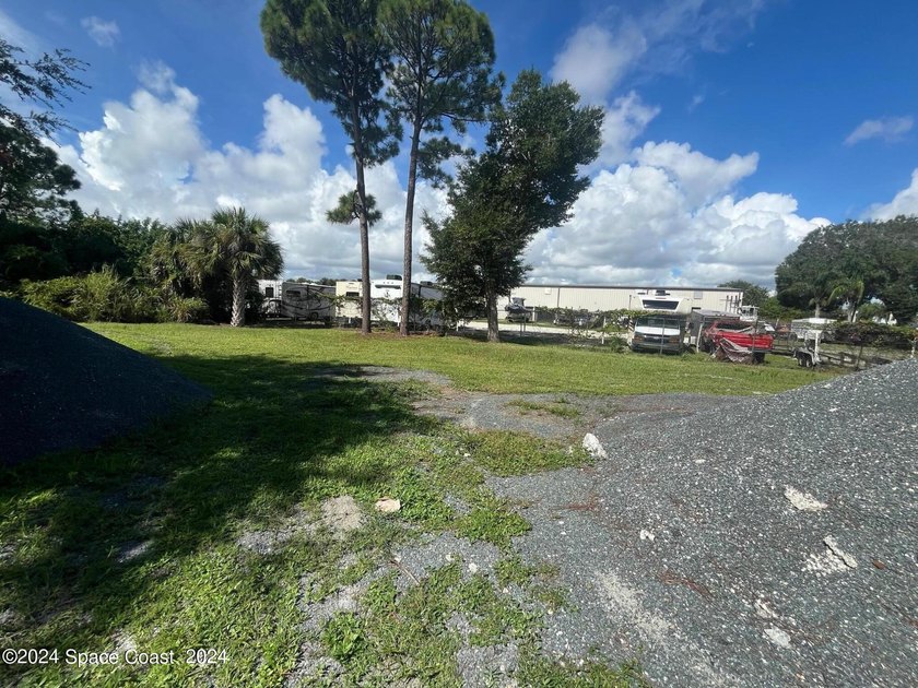 This 2.45 Industrial lot is cleared and has a foundation of - photo 8
