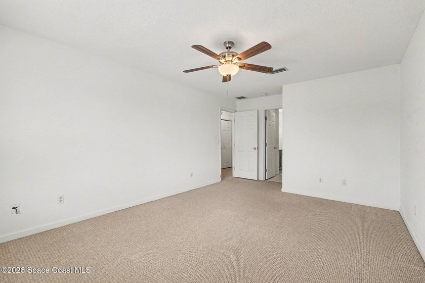 Centrally located in Titusville, this 2-bedroom, 2.5-bath - photo 17
