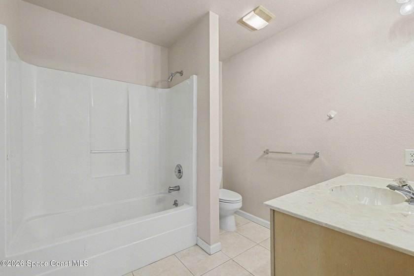 Centrally located in Titusville, this 2-bedroom, 2.5-bath - photo 19