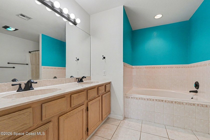 Centrally located in Titusville, this 2-bedroom, 2.5-bath - photo 21