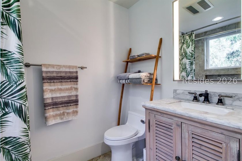 Stunning Custom-Built 4-Bedroom Home in Prime Folly Field - photo 29