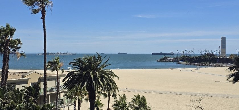 Experience the ultimate beachfront lifestyle in this beautifully - photo 2