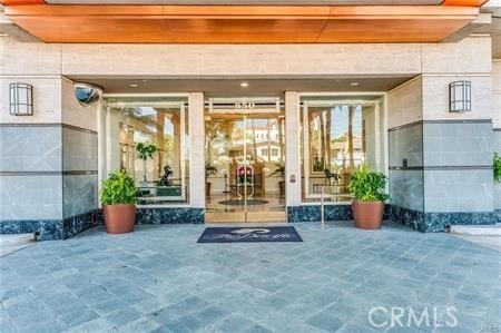 Experience the ultimate beachfront lifestyle in this beautifully - photo 3
