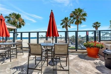 Experience the ultimate beachfront lifestyle in this beautifully - photo 7
