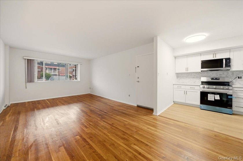 Welcome to this charming two-family Colonial-style duplex in the - photo 11