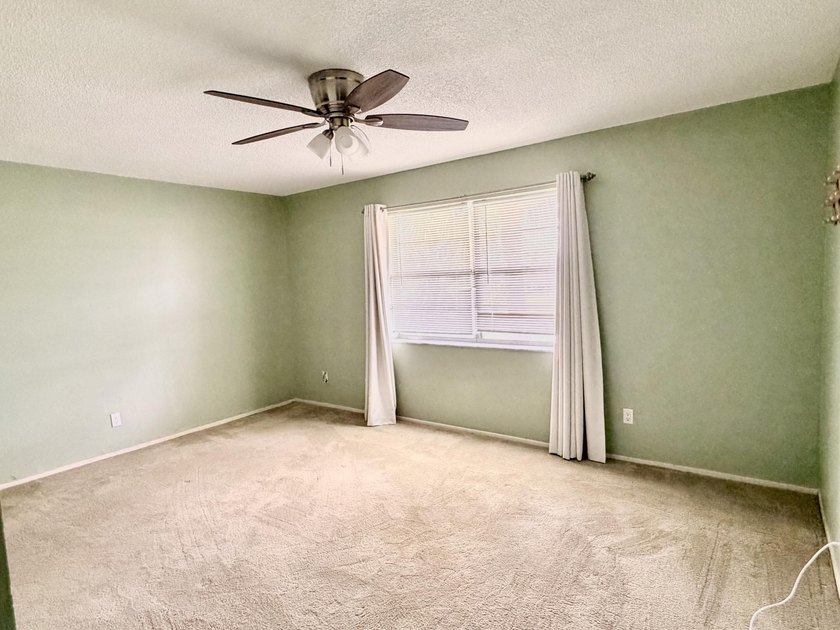 Motivated Seller!! Move-in ready 2BR/2BA 2nd-floor corner condo - photo 12