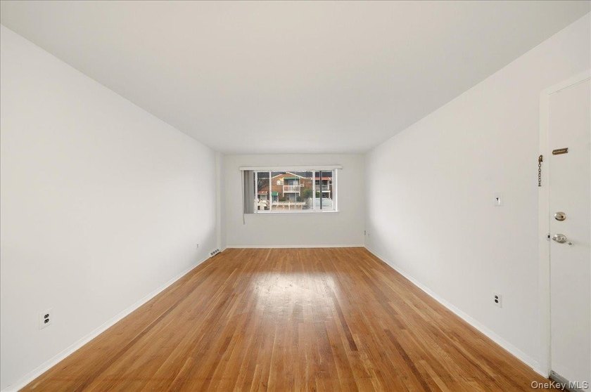 Welcome to this charming two-family Colonial-style duplex in the - photo 13