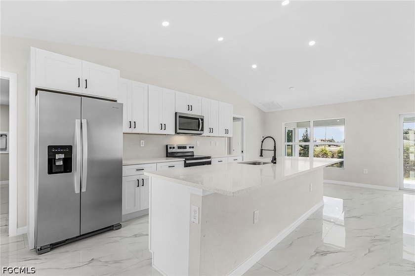 There's a quiet confidence about this home-the kind you feel the - photo 3