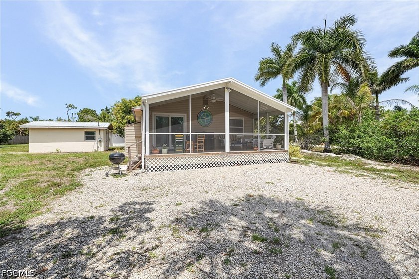 Welcome to your dream island retreat at 7257 Victory Rd in - photo 6