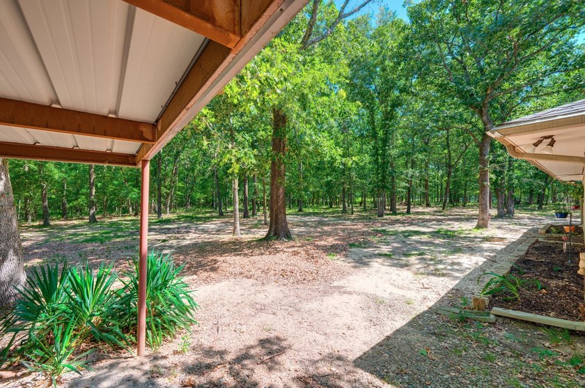 Escape to your own private East Texas retreat at 104 County Road - photo 13