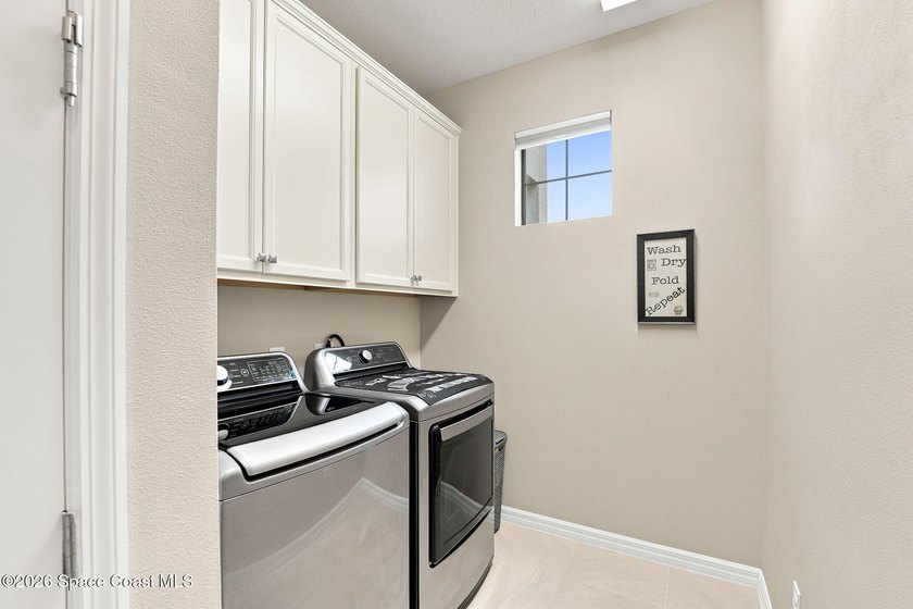 IMMACULATE LAKEFRONT HOME IN VIERA! Built in 2023 and located in - photo 35