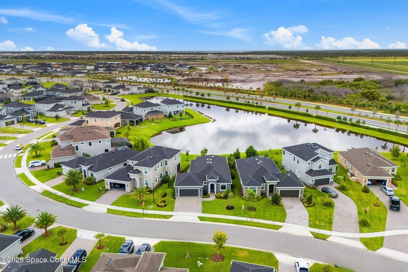 IMMACULATE LAKEFRONT HOME IN VIERA! Built in 2023 and located in - photo 46