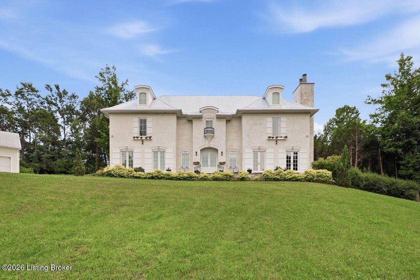 Discover this exceptional custom French-inspired estate on 8.3 - photo 4