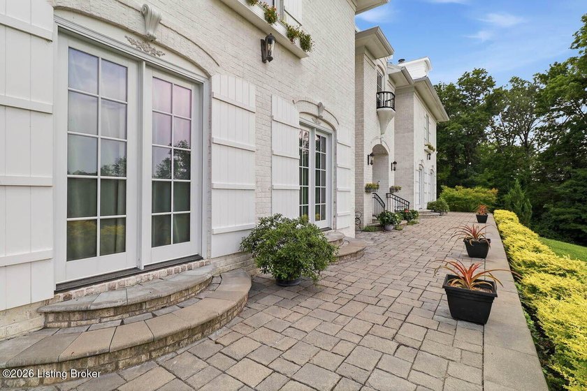 Discover this exceptional custom French-inspired estate on 8.3 - photo 7