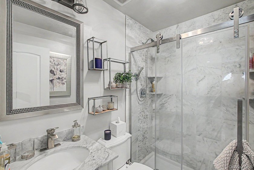 Welcome to 64 Sweetbriar Dr in Mastic - a spacious 6-bedroom - photo 17