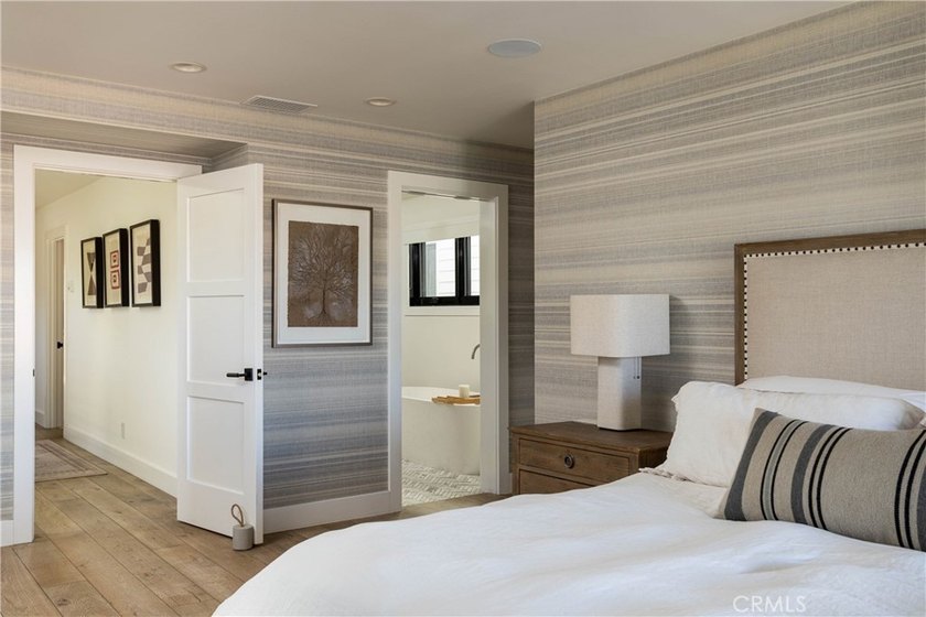 Just one block from the sand, this custom-built Newport Beach - photo 13